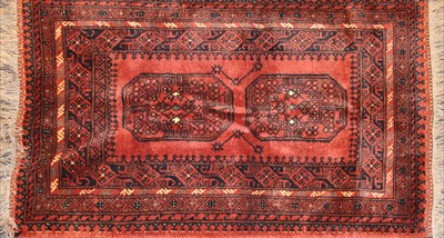 Lot 513 - A small Afghan rug