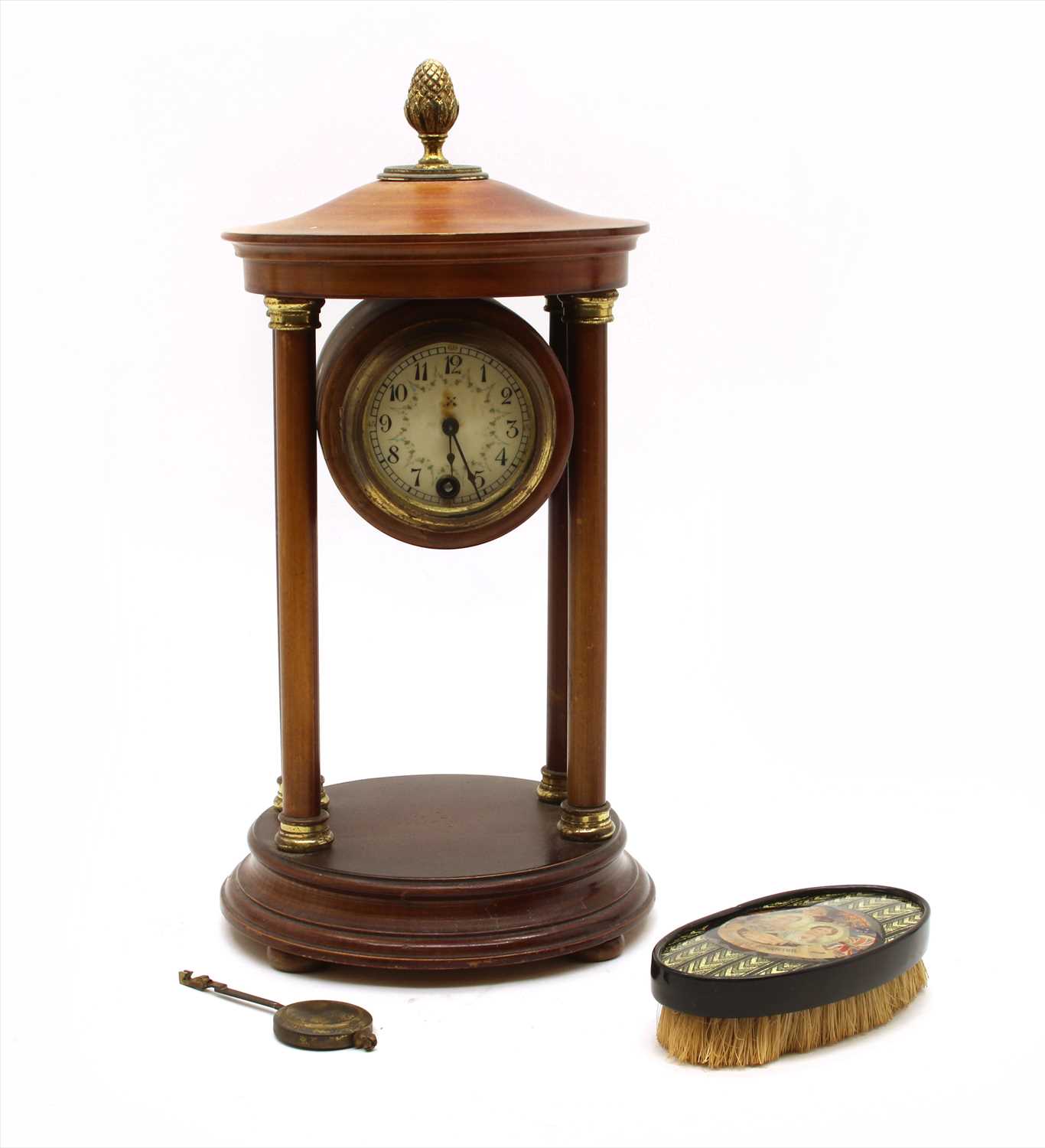 Lot 216 - A mahogany cased portico clock