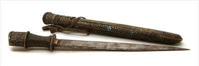 Lot 150 - A Tibetan pierced and turquoise mounted dagger