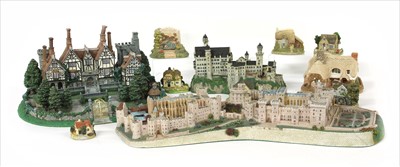 Lot 183 - A collection of miniature houses and castles
