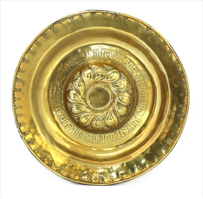 Lot 52 - A Nuremberg brass alms dish