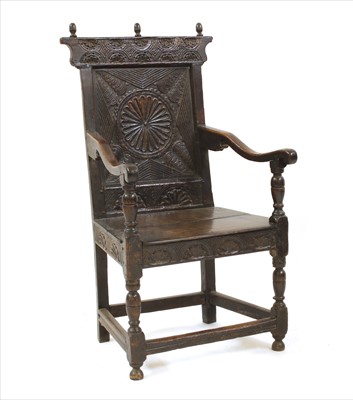 Lot 855 - An oak wainscot chair