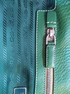 Lot 53 - A Prada green leather shoulder bag
