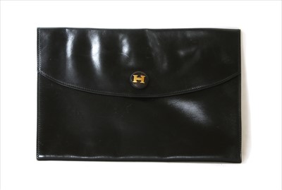 Lot 1008 - A vintage Hermès black Courchevel Rio clutch bag