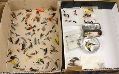 Lot 123 - Two boxes of fishing flies and various books on fishing