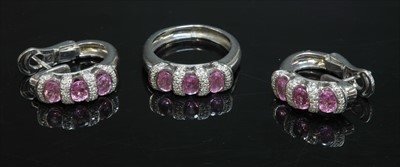 Lot 263 - An 18ct white gold pink sapphire and diamond ring and earring suite