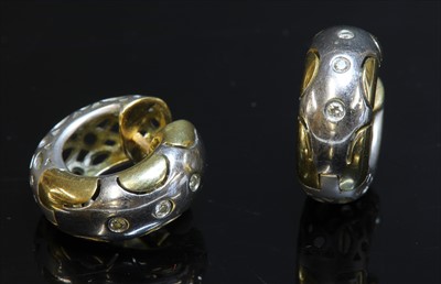 Lot 183 - A pair of 18ct gold three stone diamond hinged hoop earrings