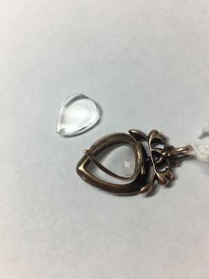 Lot 1 - A Georgian gold flat cut garnet and split pearl glazed locket pendant, c.1790