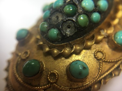 Lot 12 - A Victorian Etruscan Revival style gold turquoise brooch