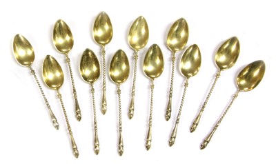 Lot 207 - A set of twelve German silver gilt demitasse spoons