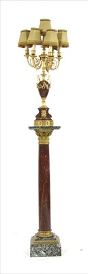 Lot 641 - A four branch five light electrolier on a similar turned column.