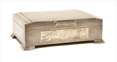 Lot 130 - An engine turned silver cigarette box