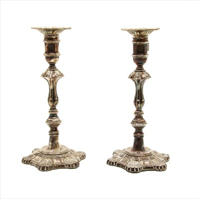 Lot 136 - A pair of silver candlesticks