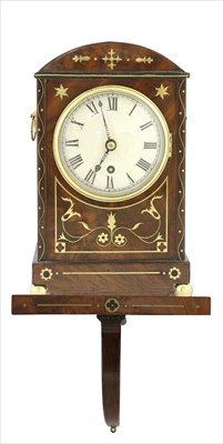 Lot 879 - A small Regency mahogany and brass inlaid bracket clock