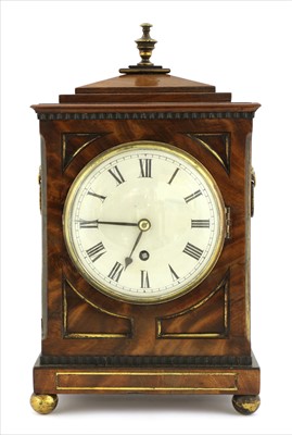 Lot 943 - A Regency mahogany mantel clock