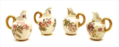Lot 189 - A matched set of four Royal Worcester blush ivory jugs