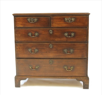 Lot 410 - A George III mahogany chest of two short over three long drawers
