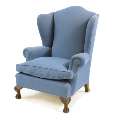 Lot 447 - A George III style wingback armchair
