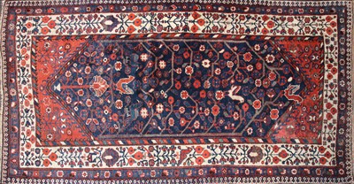 Lot 358 - A blue ground Persian rug