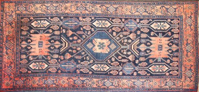 Lot 458 - A blue ground carpet