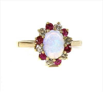 Lot 32 - A 9ct gold opal, diamond and ruby cluster ring