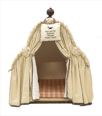 Lot 779 - An upholstered dog kennel