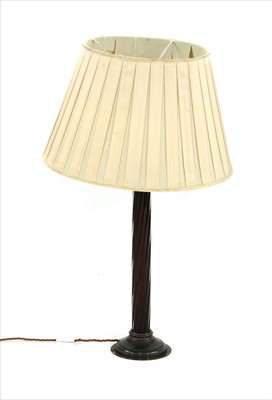 Lot 294 - A modern bronze and glass twist column table lamp with shade
