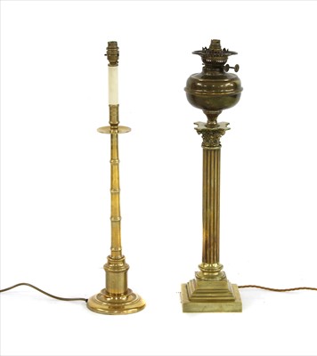 Lot 293 - A brass column oil lamp