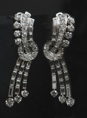 Lot 138 - A pair of diamond set waterfall drop earrings, c.1940
