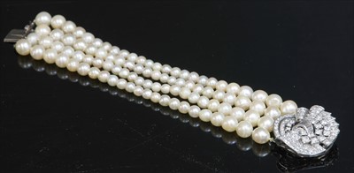 Lot 166 - A four row graduated cultured pearl bracelet, c.1950