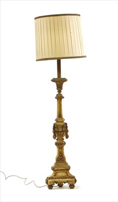 Lot 454 - A carved and gilt stand lamp