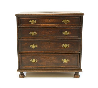 Lot 390 - An oak chest of drawers