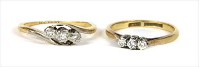 Lot 36 - A gold three stone diamond ring