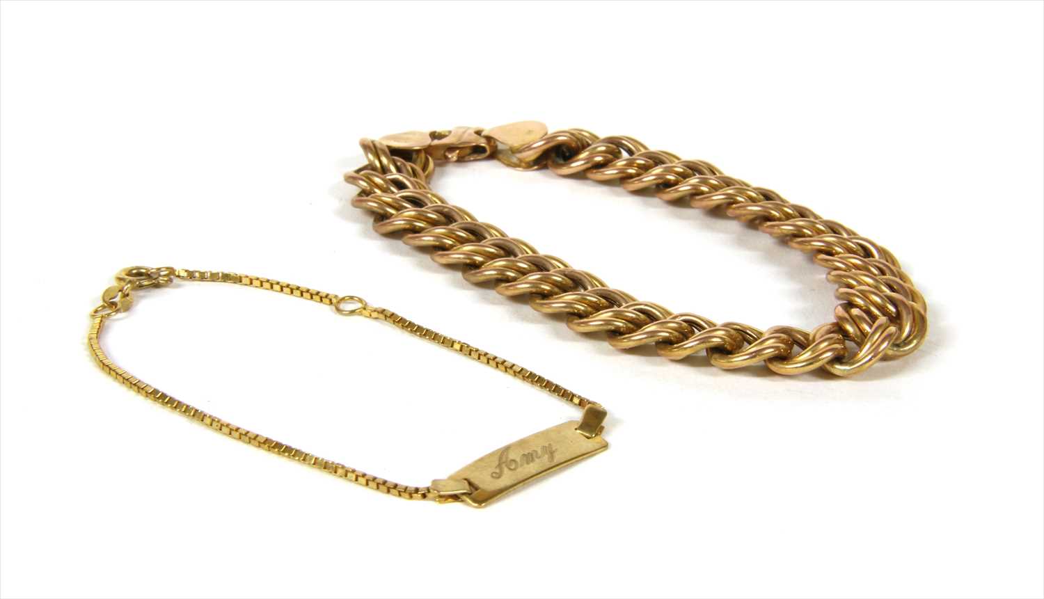 Lot 14 - A 9ct gold hollow double curb link bracelet