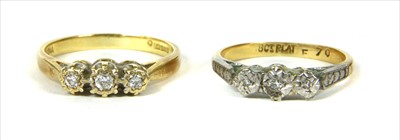 Lot 26 - An 18ct gold three stone diamond ring