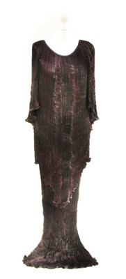 Lot 1068 - A Charles and Patricia Lester dark purple evening outfit, in the 'Fortuny Style'