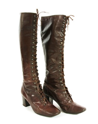 Lot 1056 - A pair of Yves Saint Laurent heeled knee-high boots