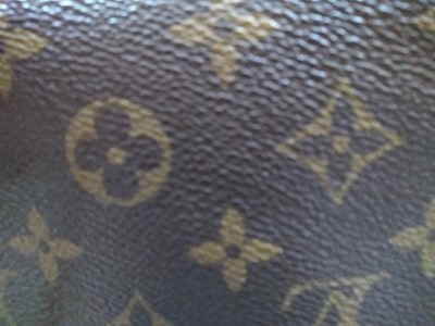 Lot 258 - A Louis Vuitton monogrammed canvas 'Recital' shoulder bag