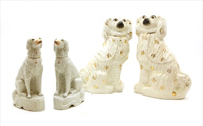 Lot 308 - Two pairs of Staffordshire spaniel figures