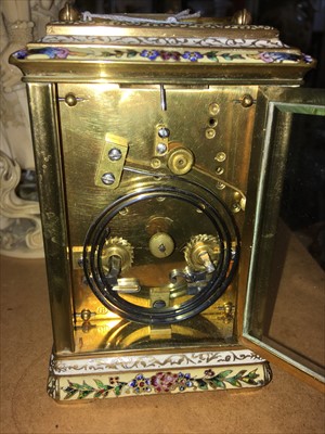 Lot 208 - A champlevé enamel carriage clock