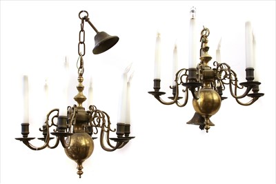 Lot 196 - A pair of brass five branch ceiling lights