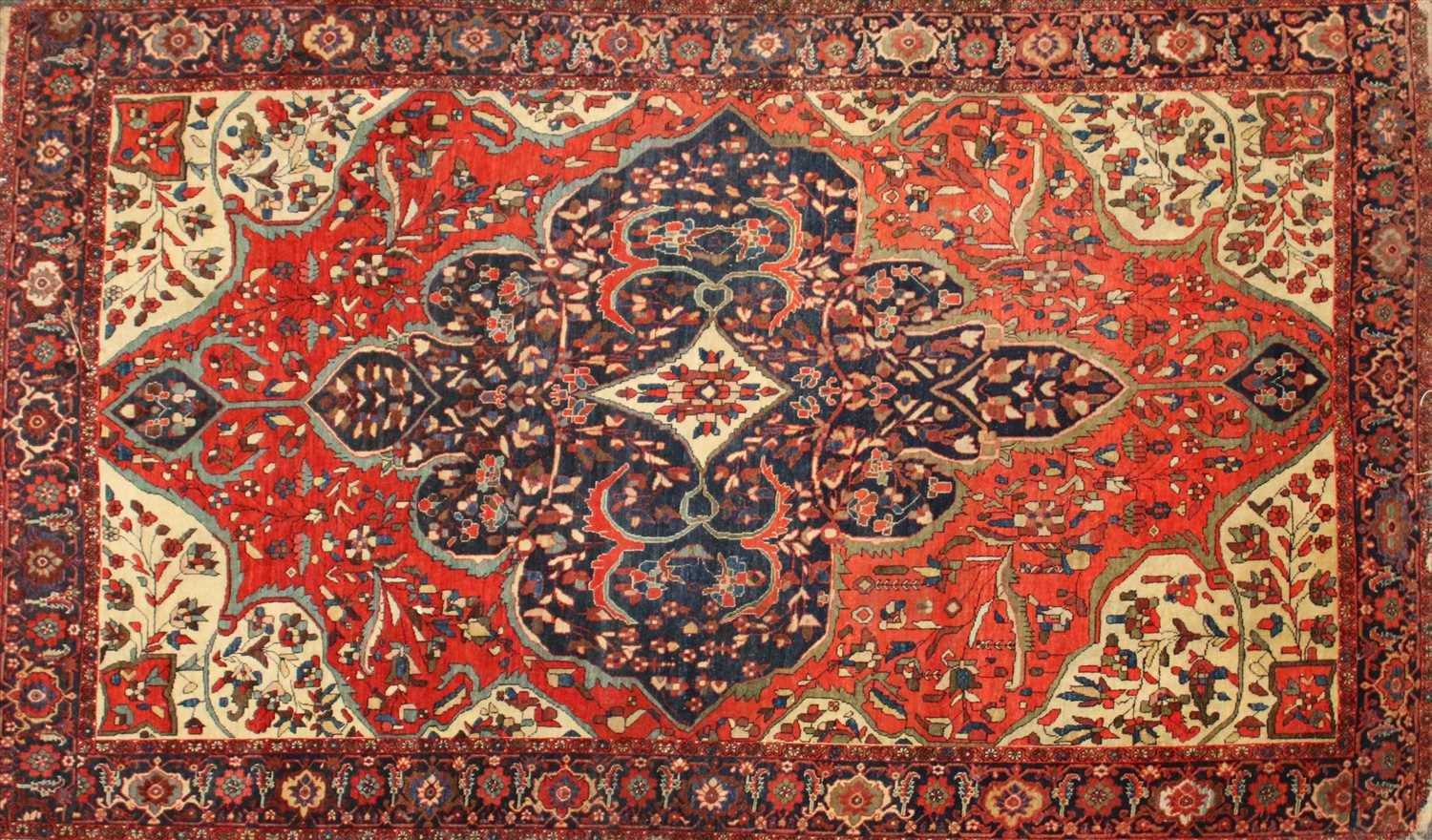 Lot 665 - A fine Persian Isfahan rug