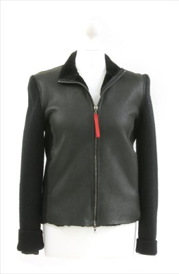 Lot 1095 - A Prada zip-up jumper with front leather panels