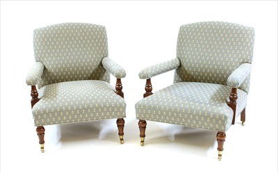 Lot 361 - A pair of Howard & Son style armchairs