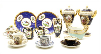 Lot 265 - A pair of Sevres style Continental porcelain urns and covers