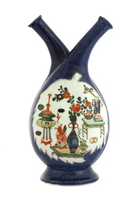 Lot 14 - A Chinese oil and vinegar bottle