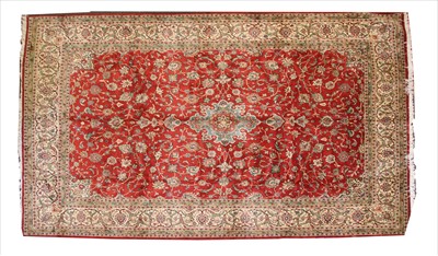 Lot 859 - A Persian Kashan carpet