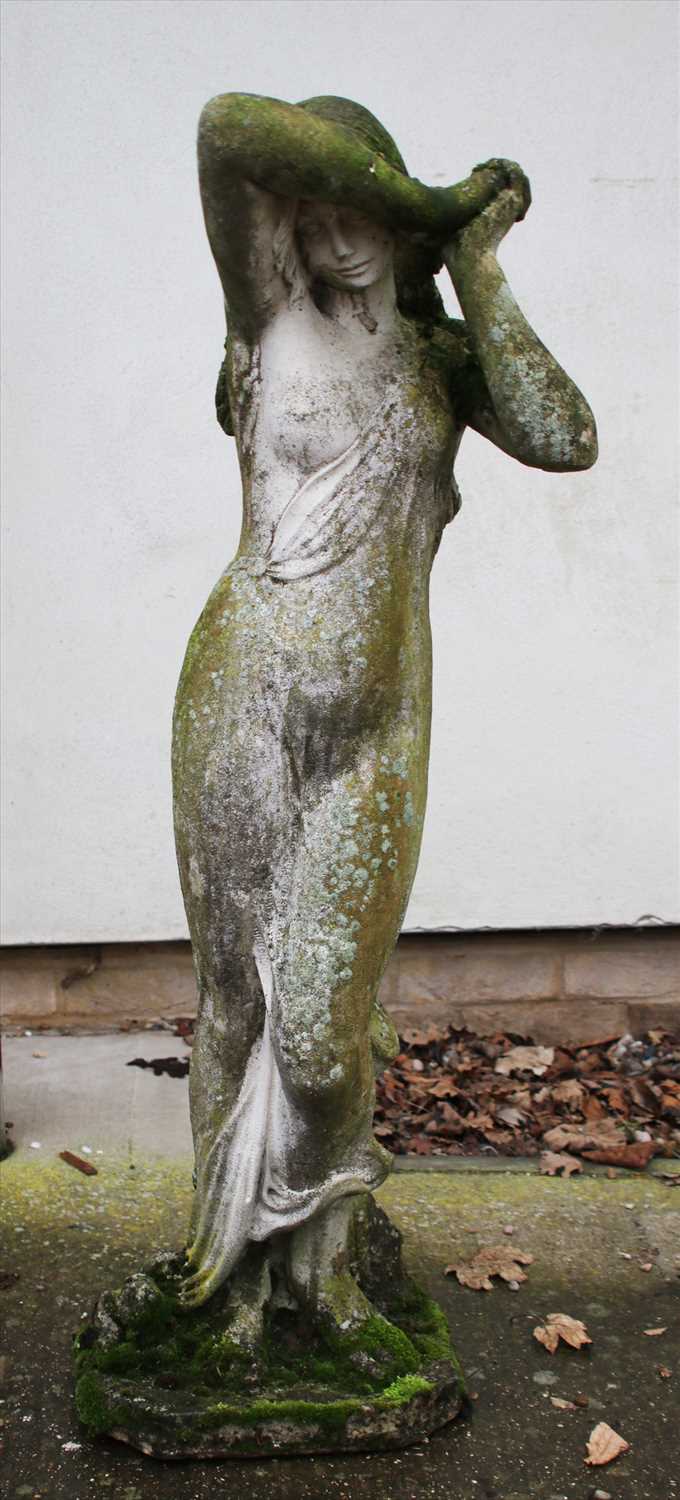 Lot 469 - A composition concrete garden statue