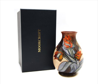 Lot 266 - A Moorcroft vase in the tulip pattern