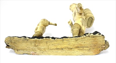 Lot 156 - A Japanese carved ivory sectional okimono